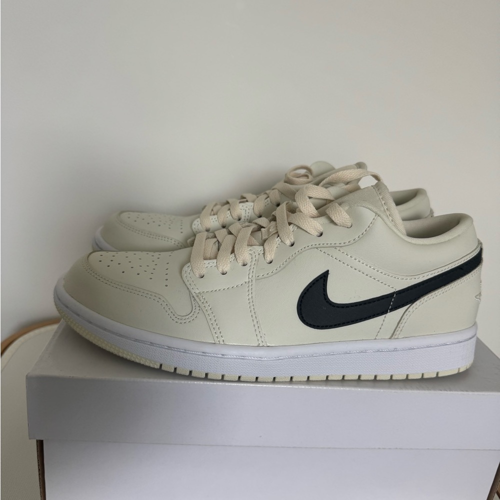 Air Jordan 1 Low Cream and Black Sneakers